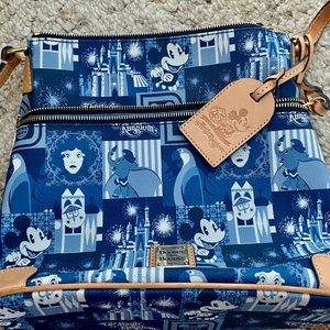Disney Dooney and Bourke ( Brand new. No tags).